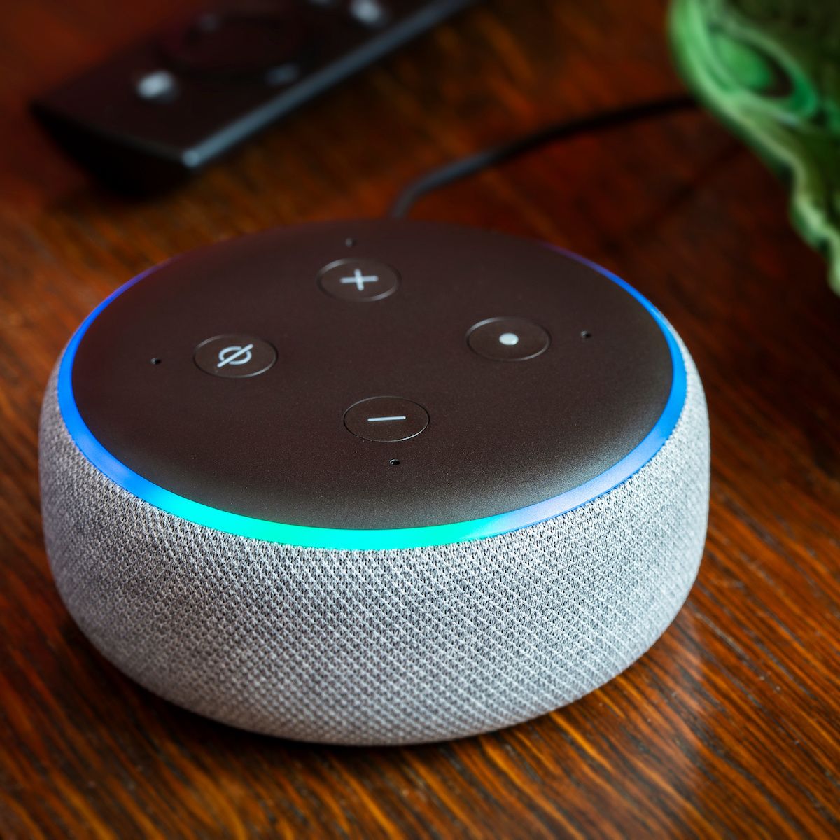 A close-up photo of a 3rd generation Amazon Echo Dot — if you own one of these, you should opt out of Amazon Sidewalk Wi-Fi sharing.